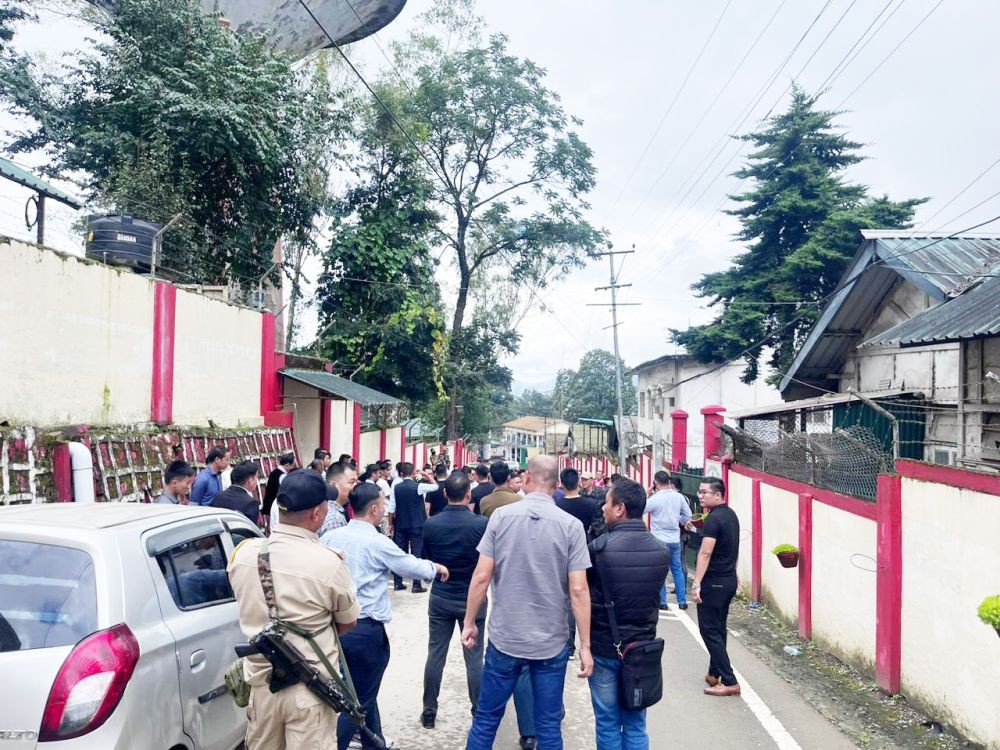 People gather during the commotion that occurred after the ASU President was reportedly assaulted by an AR jawan in Kohima on August 9.